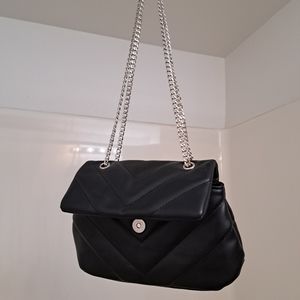 Like new black puffy purse with chain straps